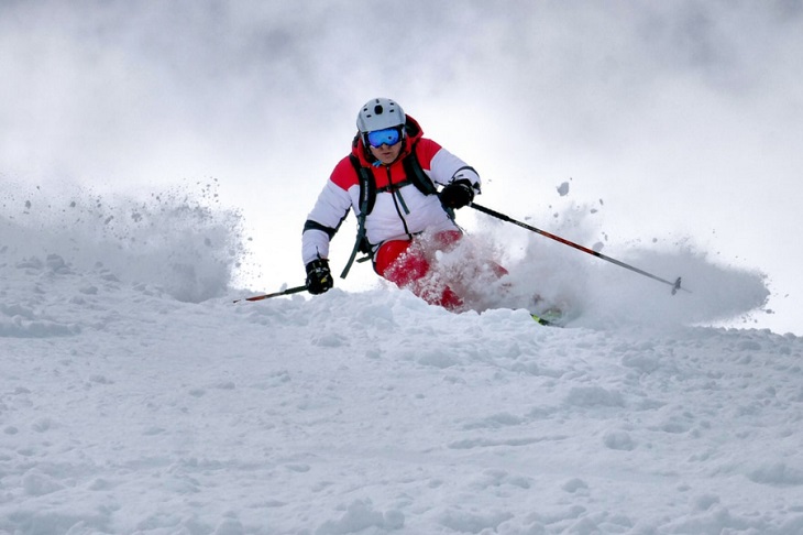 best ski jacket - shredding the snow